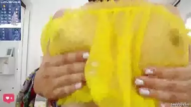 Hot Indian wife in transparent blouse and panty fingering her pussy