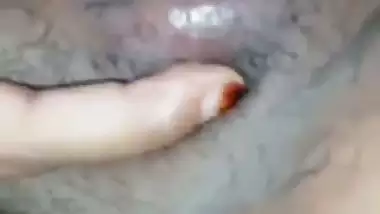 Desi girl poses nude in front of a mirror