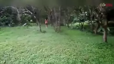 Two hot and sexy Desi aunty bathing in a outdoor under rain together