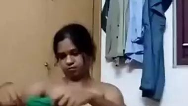 Indian MILF flashes her breasts on camera during changing in home porn