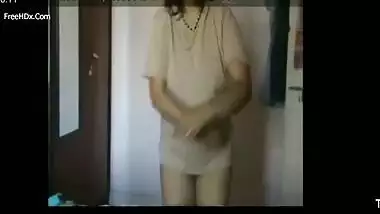 Short clip of classy Indian housewife covering XXX tits after sex