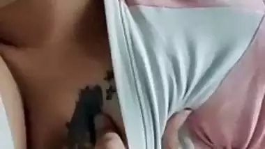 Tattooed breasts Indian girl showing boob on video call