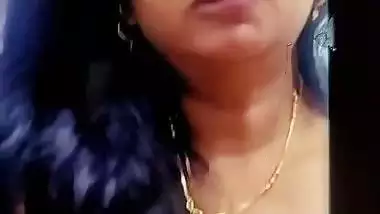 MILF horny expression with big boobs showing