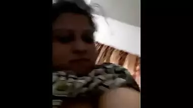 Cute Indian girl takes XXX sized tits out boasting about them on camera
