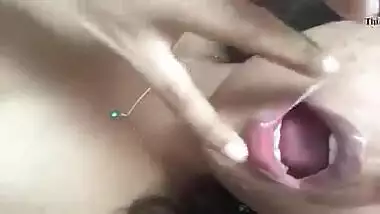 Indian cutie tastes pussy juice during the time that she masturbates her wet crack