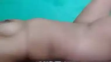 Desi Bhabhi showing her naked hairless pussy